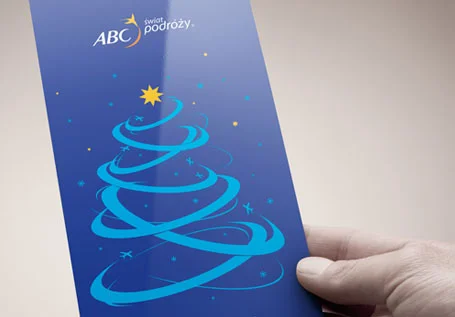 Projekt okolicznościowej kartki świątecznej dla biura podróży ABC Świat Podróży